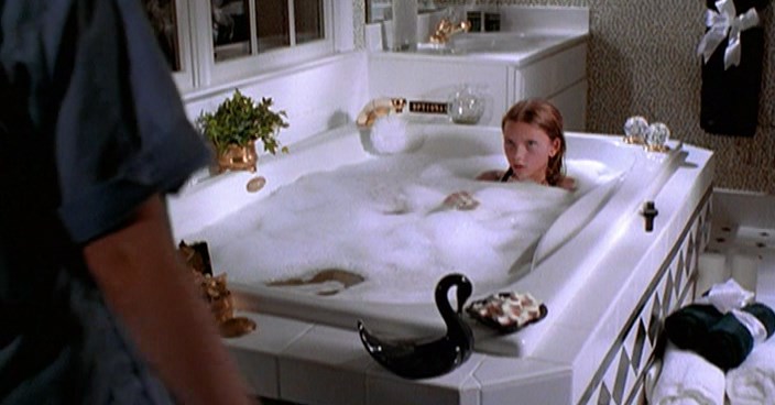 12-year-old Scarlett Johansson takes bath. 